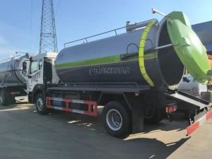 Suction sewage truck behind